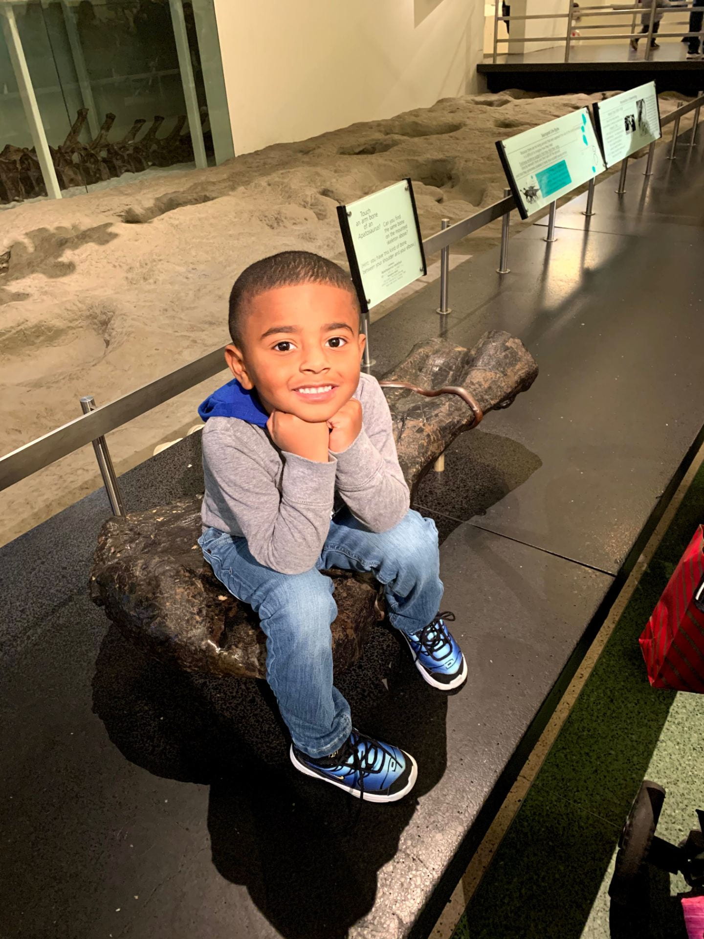 student posing for a photo at the american museum of natural history