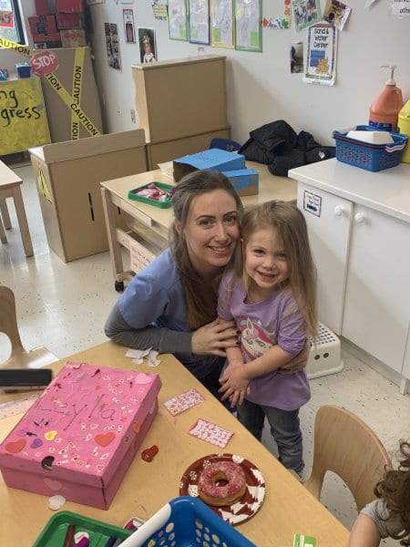 child sharing a donut with mommy child sharing a donut with mommy