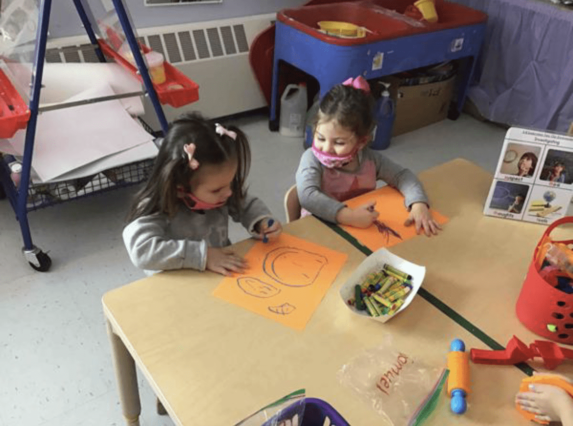 students participating in an art activity